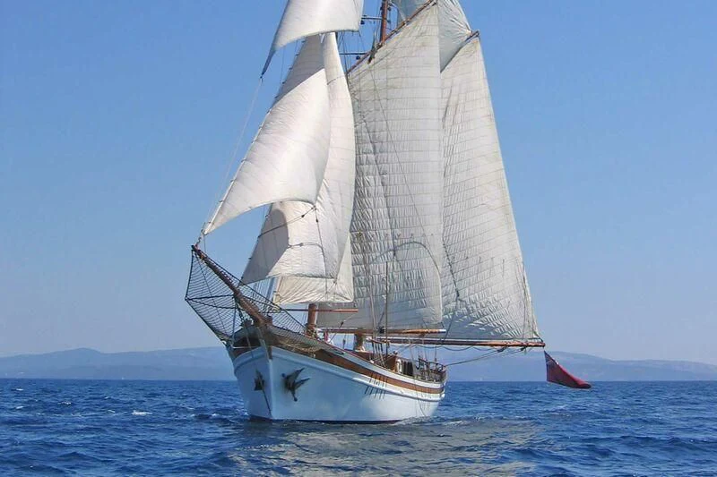 a sailboat on the water aboard LA MAIA Yacht for Sale
