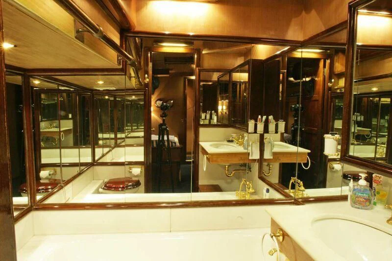 a bathroom with a large mirror aboard LA MAIA Yacht for Sale