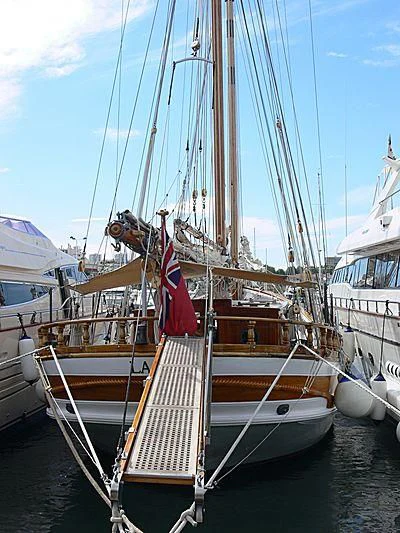 a boat with a flag on it aboard LA MAIA Yacht for Sale