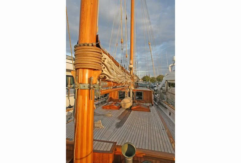a large ship with a large sail aboard LA MAIA Yacht for Sale
