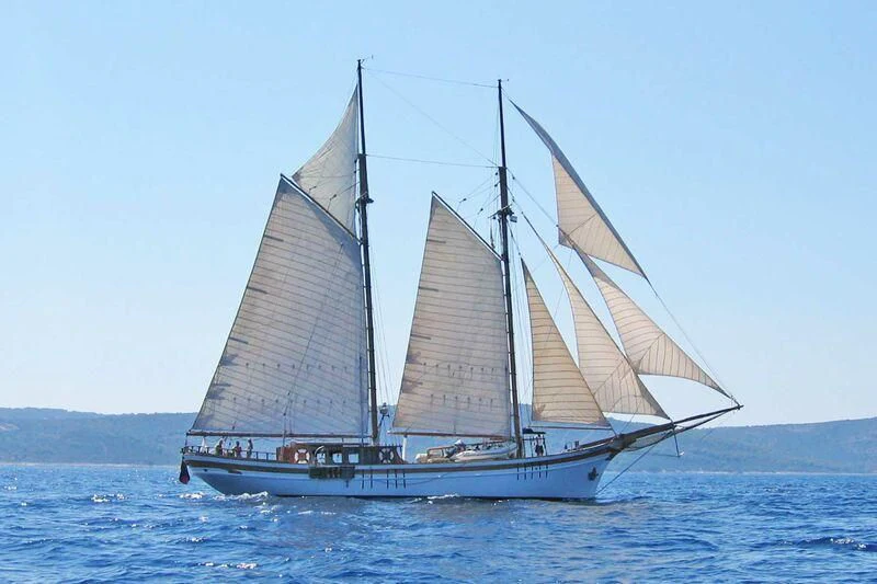 a sailboat on the water aboard LA MAIA Yacht for Sale