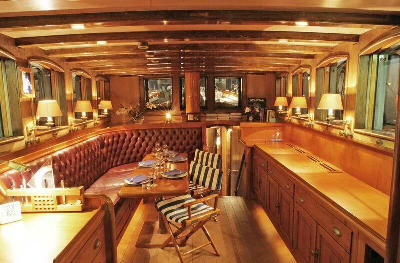 a large kitchen and dining room aboard LA MAIA Yacht for Sale