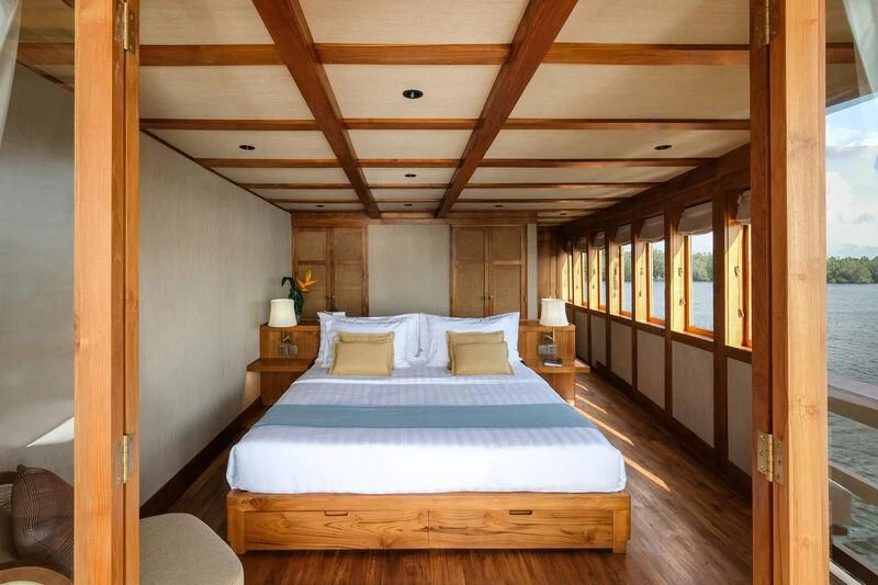 a bed in a room aboard CELESTIA Yacht for Sale