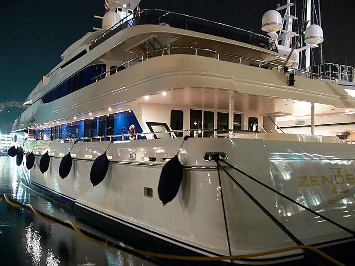 a large cruise ship docked aboard ZENOBIA Yacht for Sale