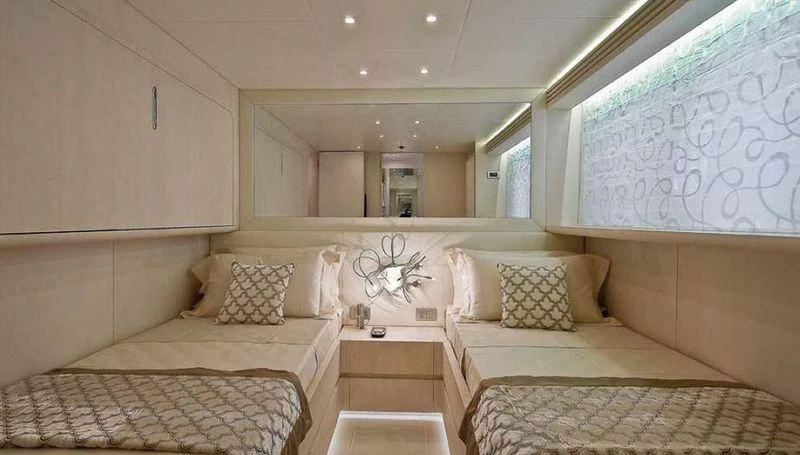 a room with two beds aboard WHITE KNIGHT Yacht for Sale