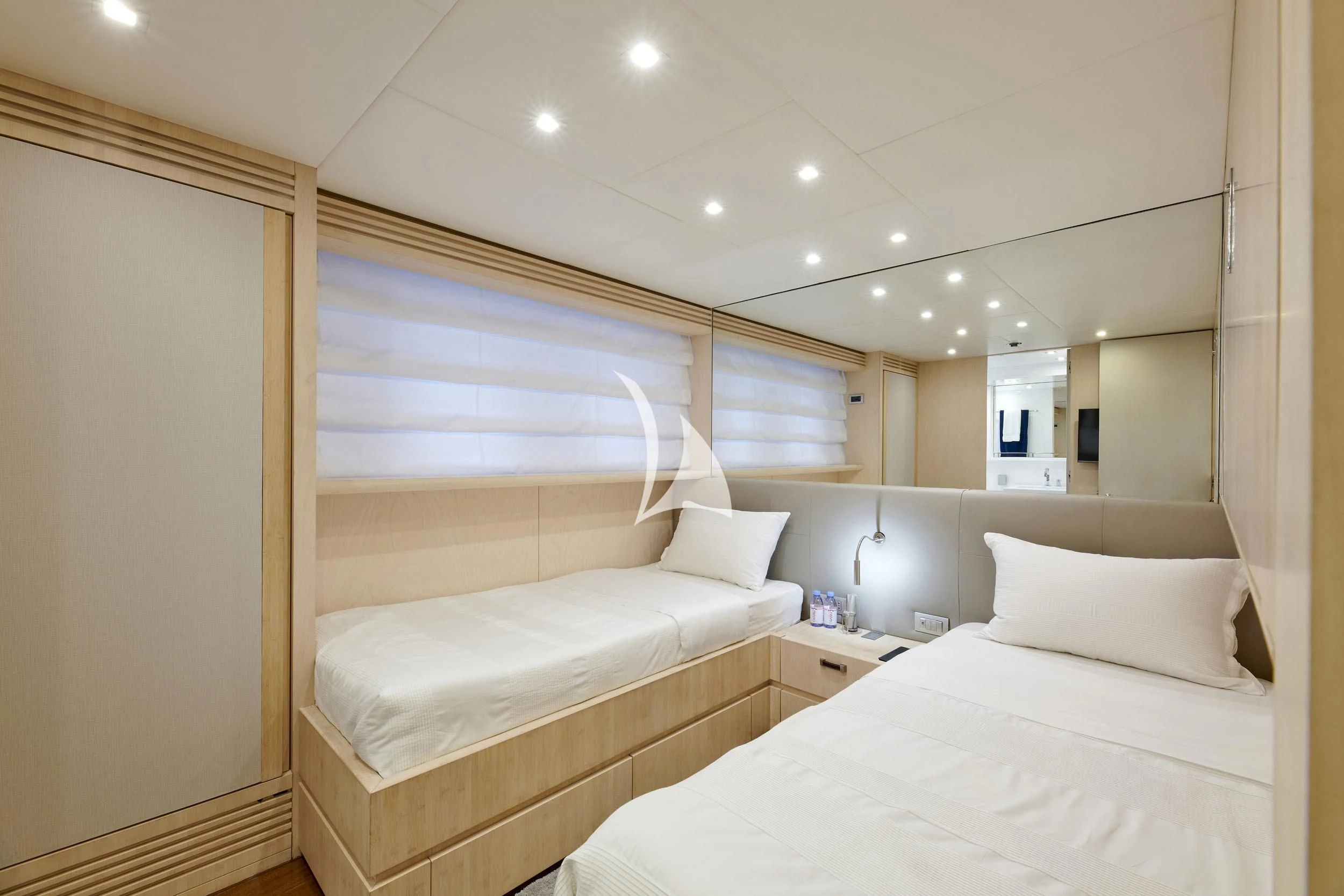 a room with two beds aboard WHITE KNIGHT Yacht for Sale
