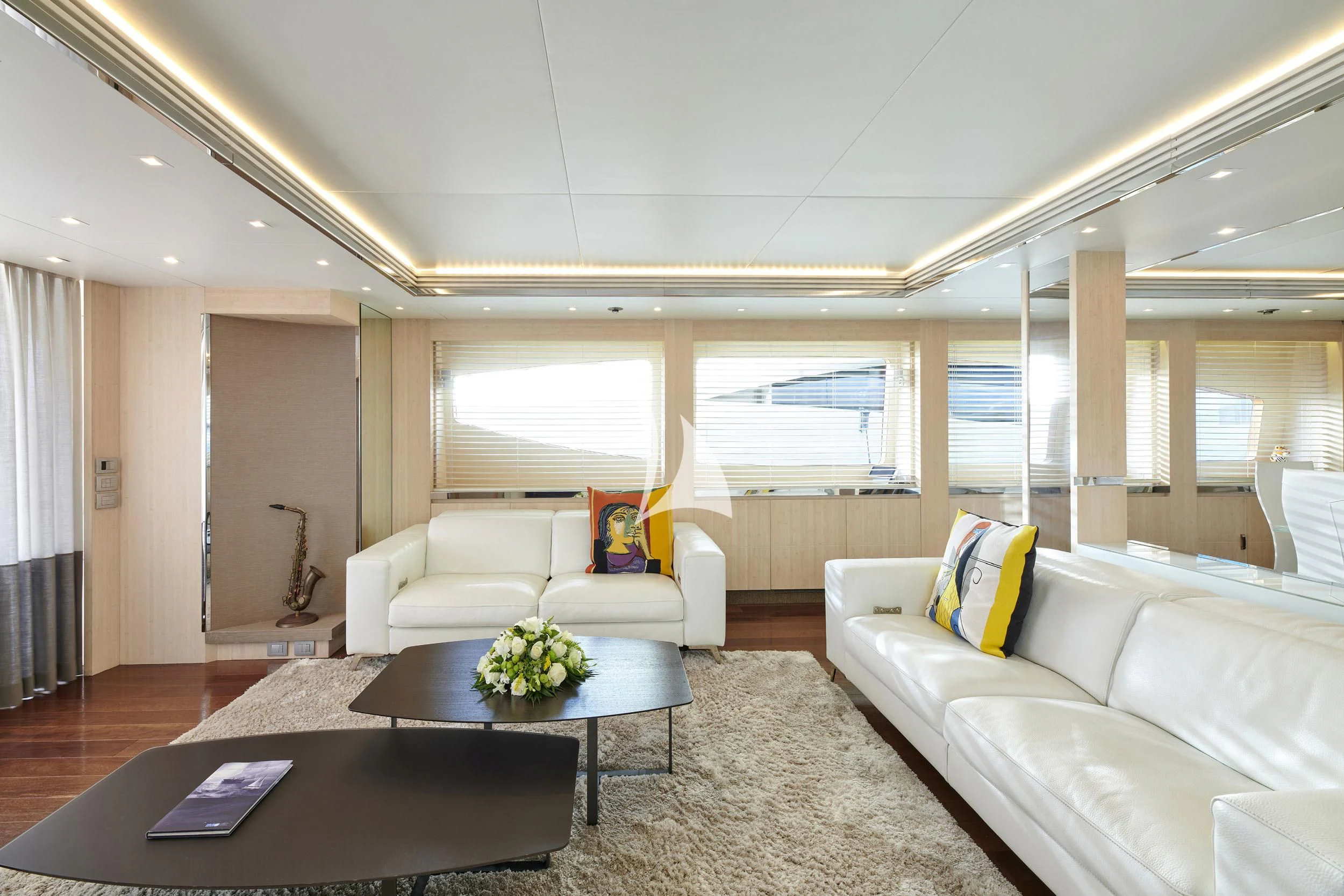 a living room with white couches aboard WHITE KNIGHT Yacht for Sale