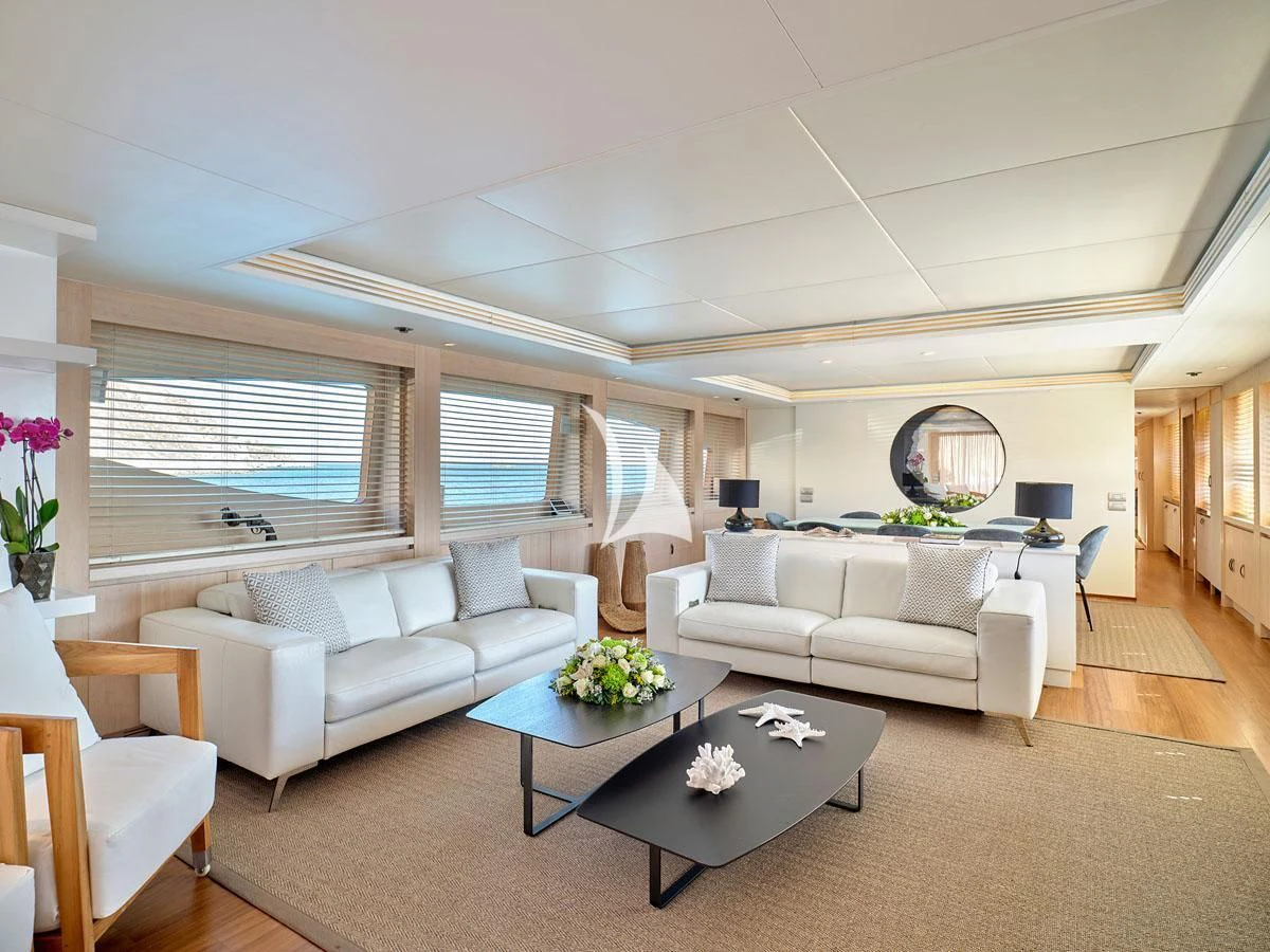 a living room with a large window aboard WHITE KNIGHT Yacht for Sale