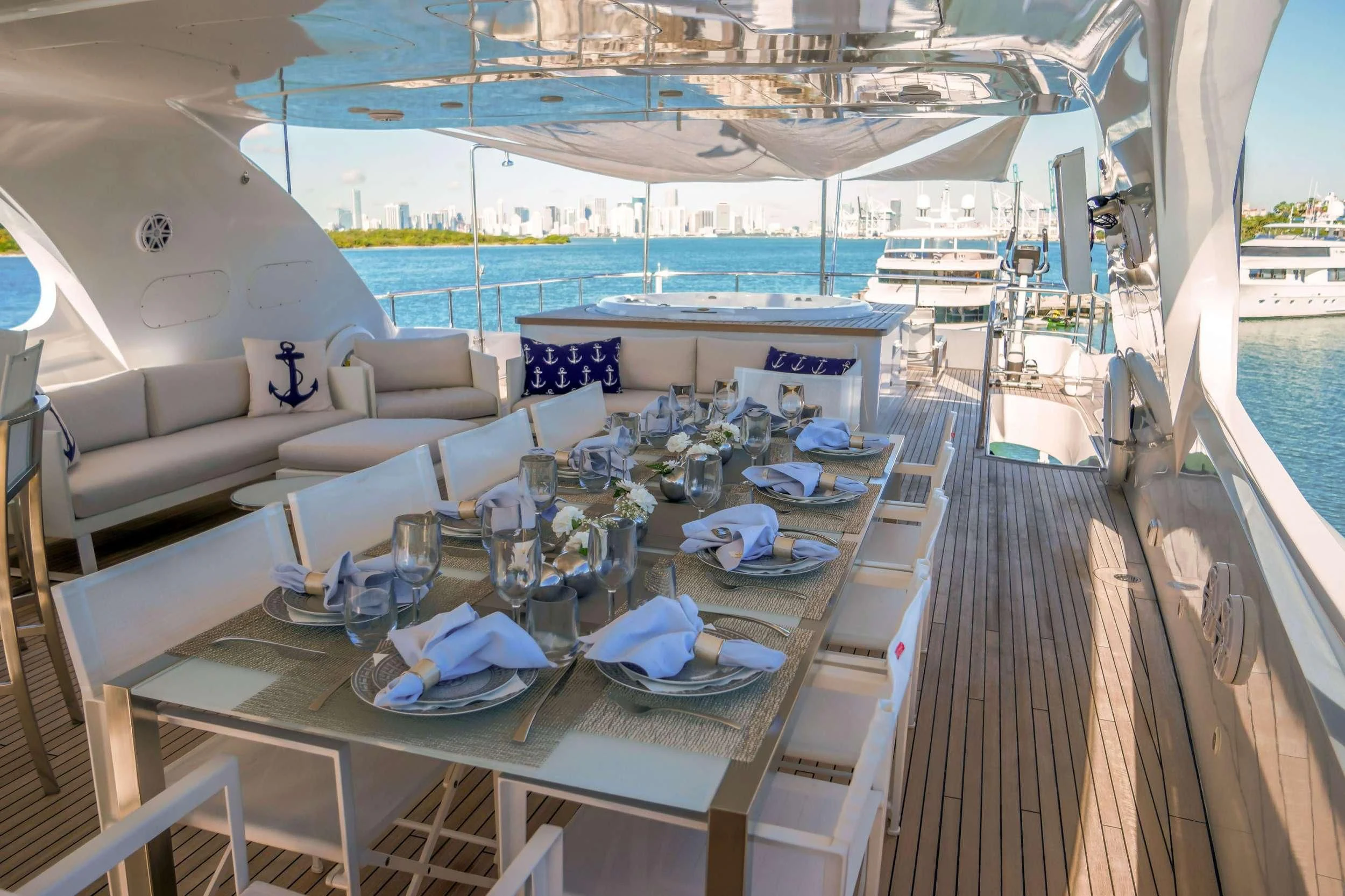 a table set for a dinner party aboard WHITE KNIGHT Yacht for Sale