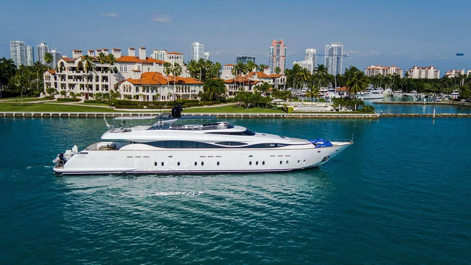 a white yacht on the water aboard WHITE KNIGHT Yacht for Sale