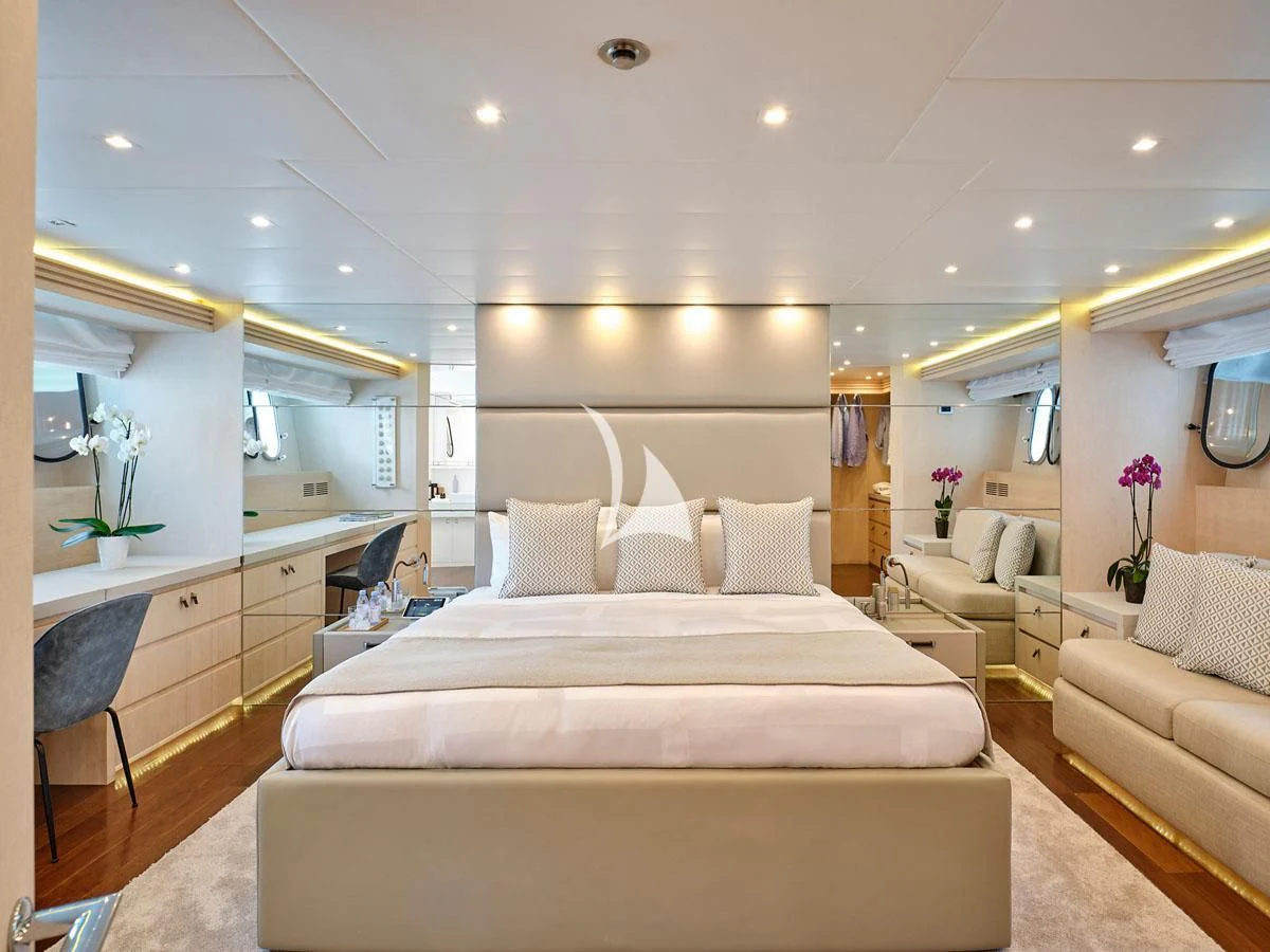 a large bedroom with a large bed aboard WHITE KNIGHT Yacht for Sale