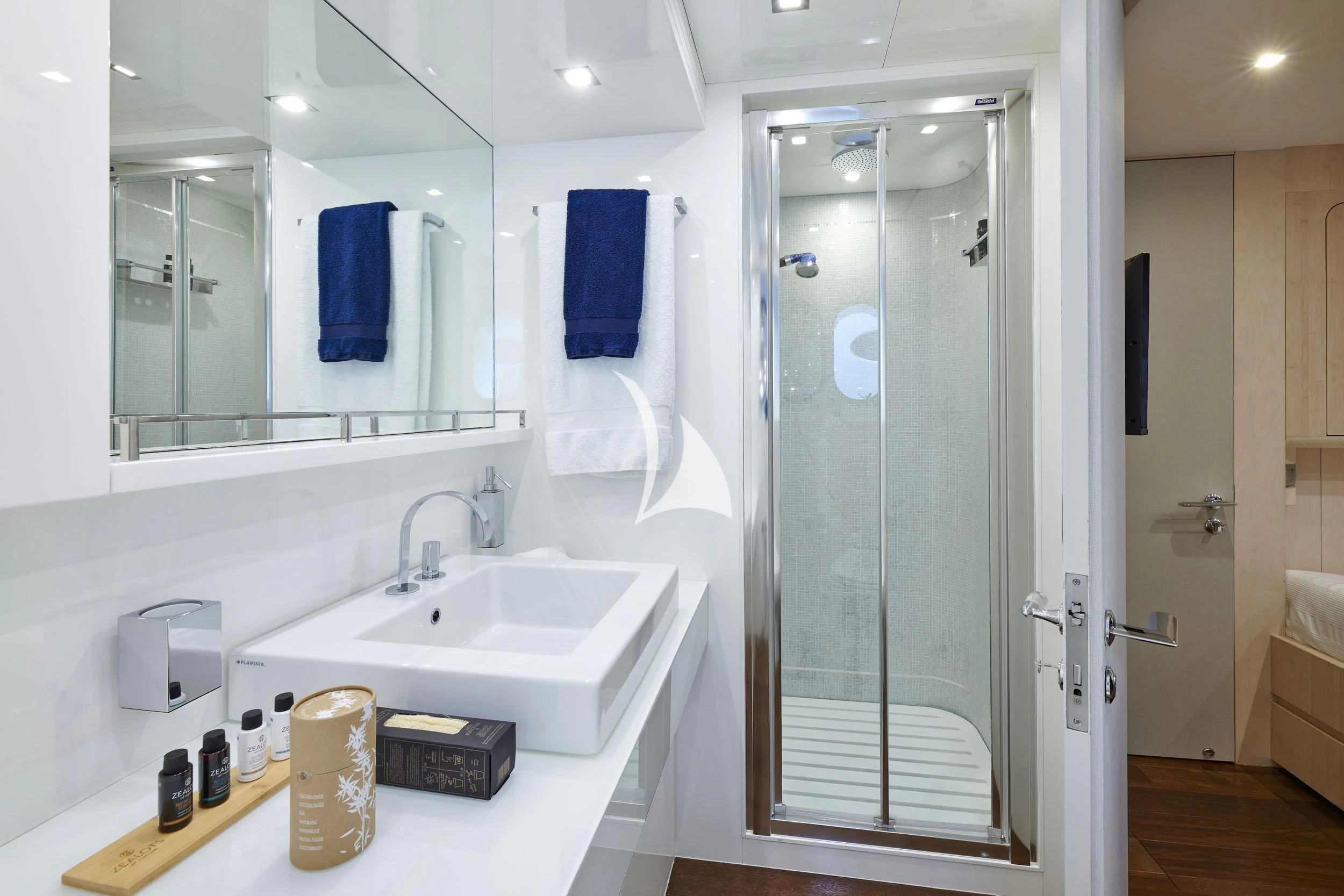 a bathroom with a glass shower aboard WHITE KNIGHT Yacht for Sale