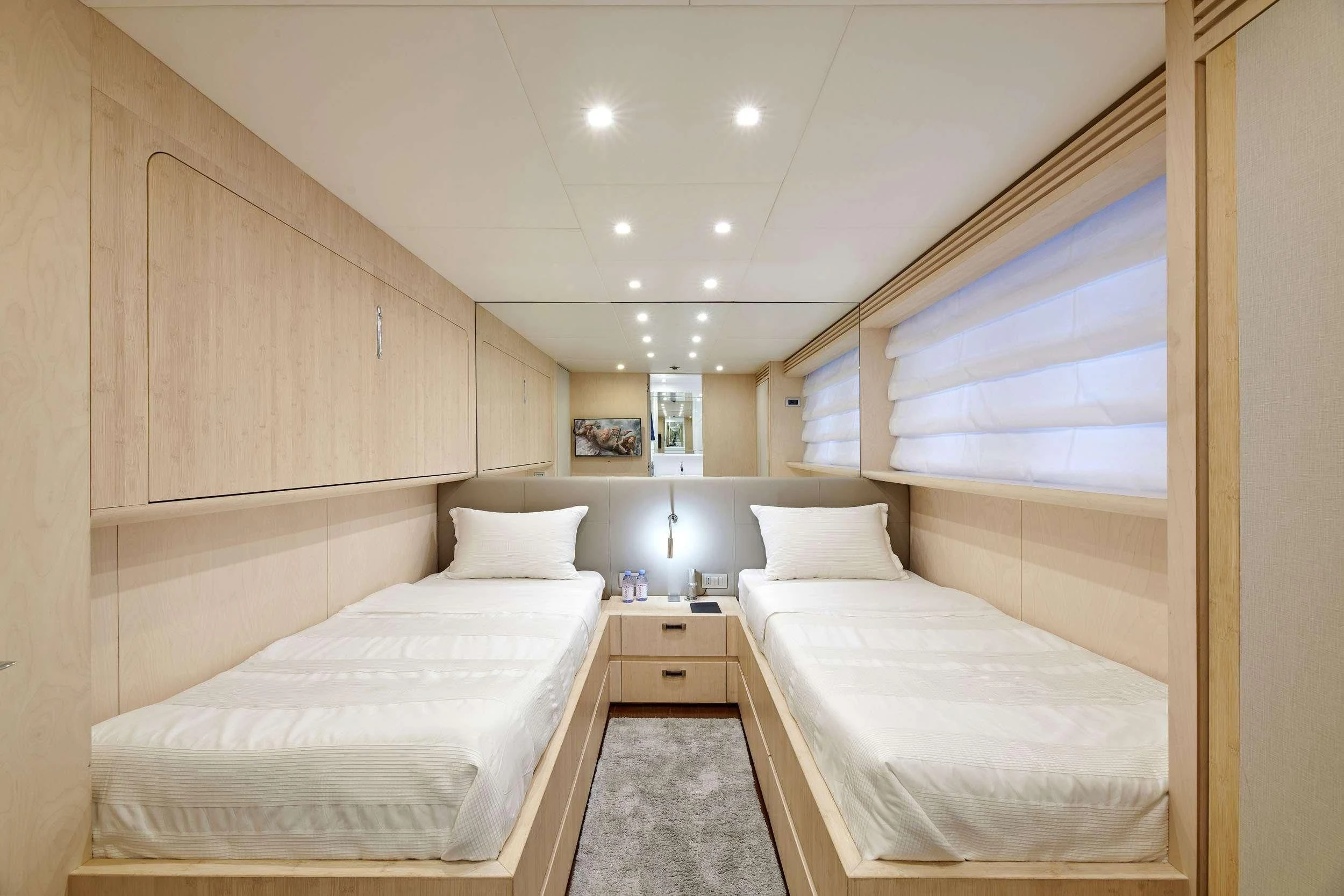 a room with two beds aboard WHITE KNIGHT Yacht for Sale