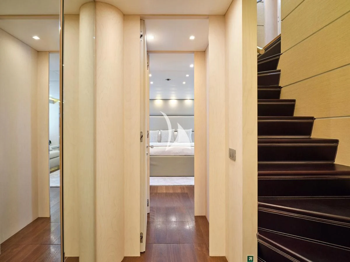 a hallway with a glass door aboard WHITE KNIGHT Yacht for Sale