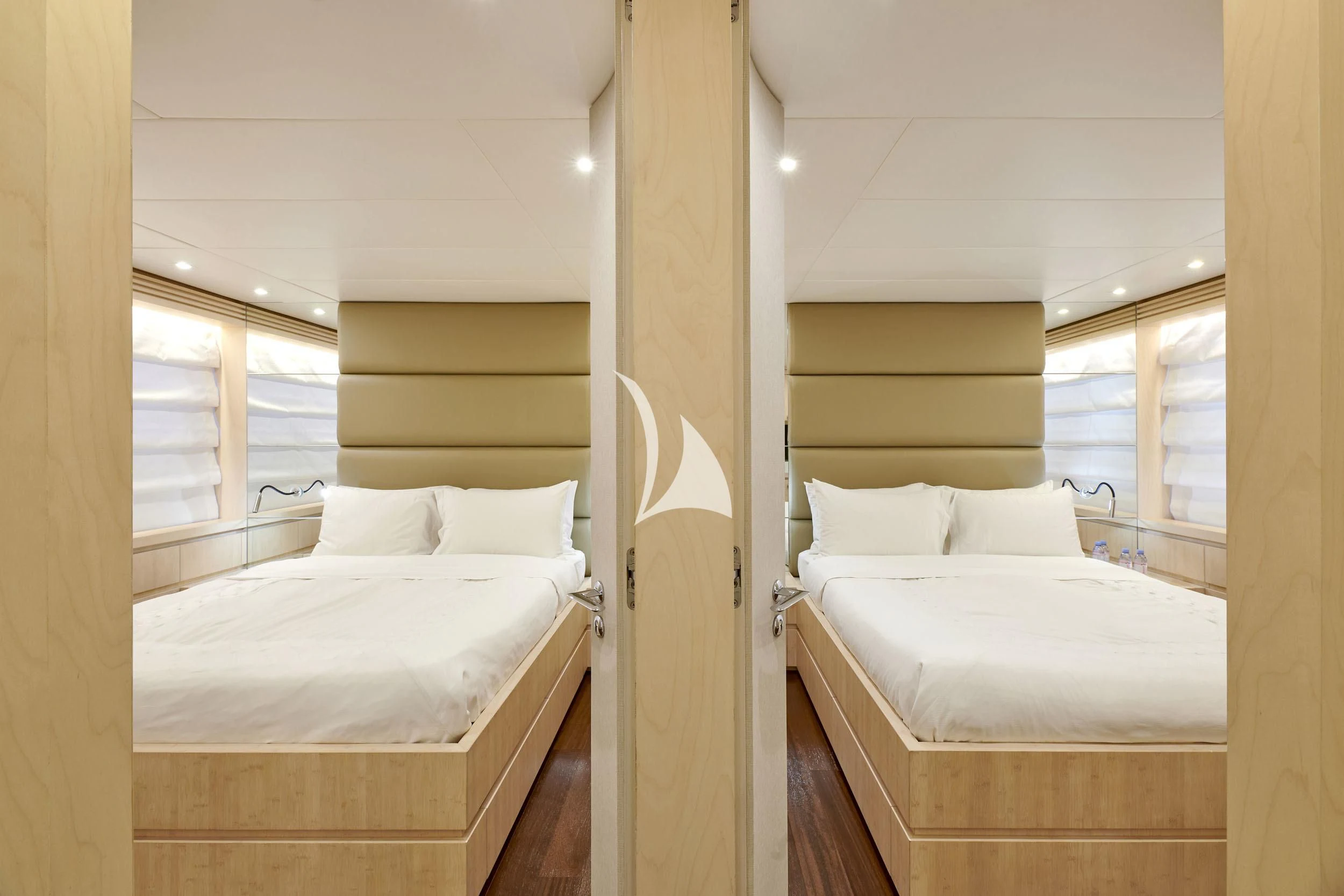 a room with two beds aboard WHITE KNIGHT Yacht for Sale