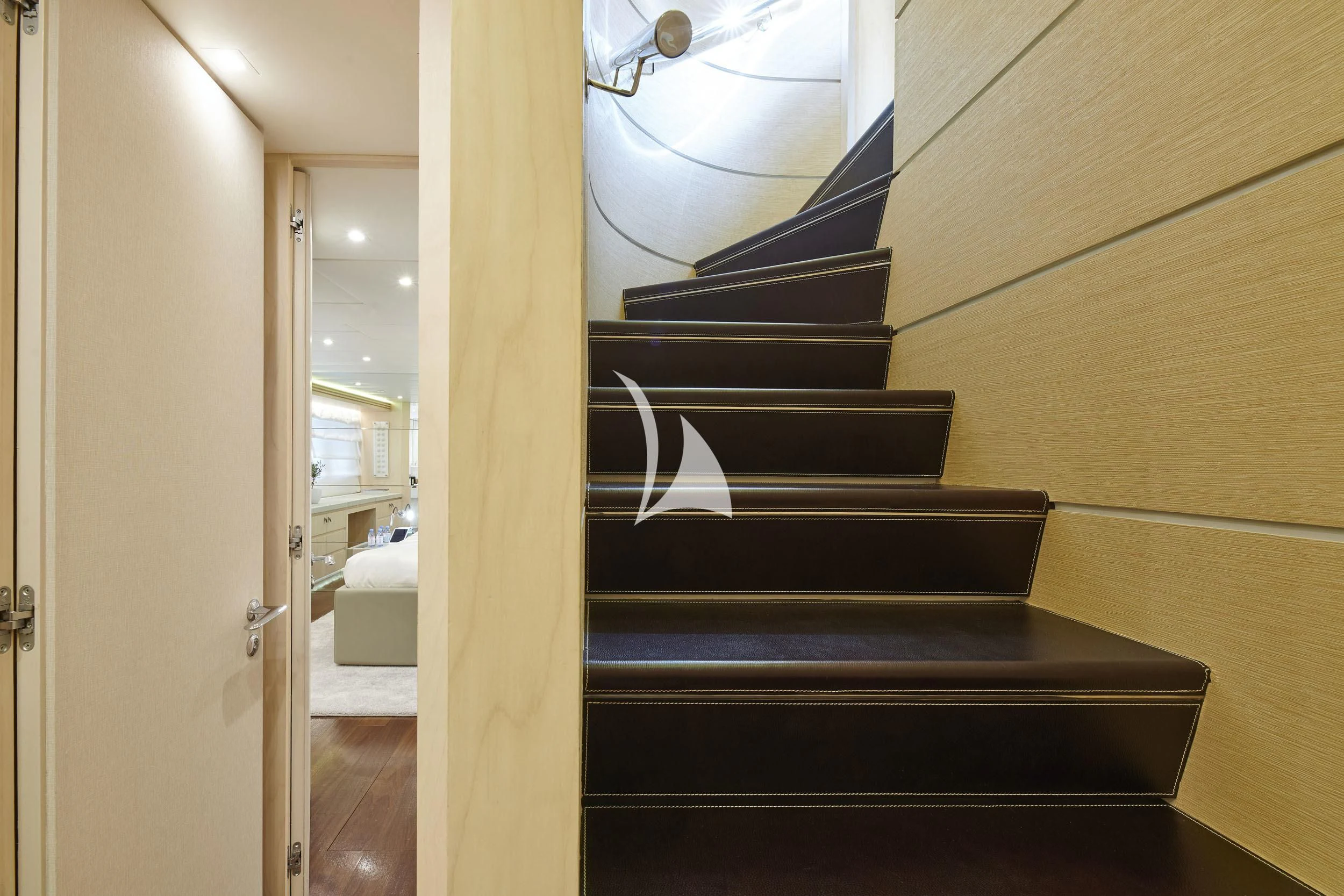 a black staircase with a white wall aboard WHITE KNIGHT Yacht for Sale