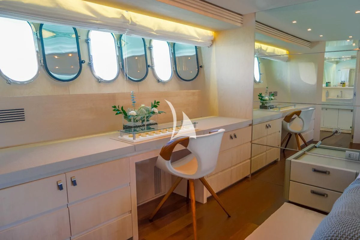 a bathroom with a chair and sink aboard WHITE KNIGHT Yacht for Sale