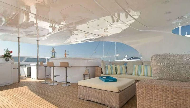 a large room with a large pool aboard WHITE KNIGHT Yacht for Sale