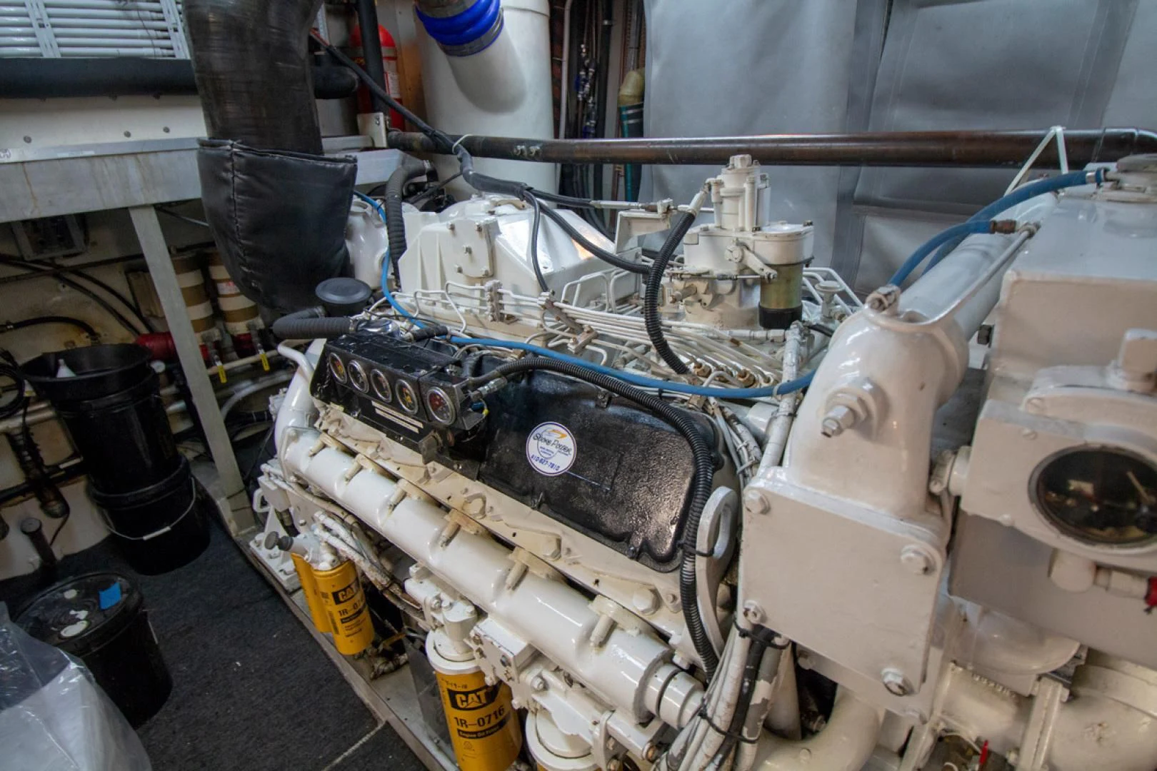 a machine with a large metal cylinder aboard LIQUIDITY Yacht for Sale