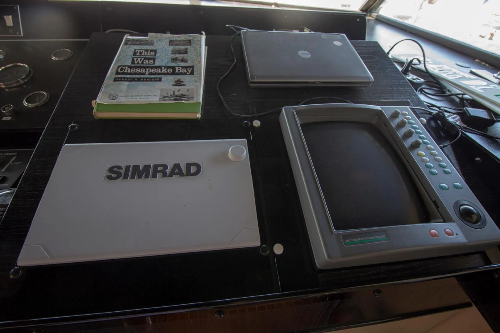 a group of electronic devices aboard LIQUIDITY Yacht for Sale