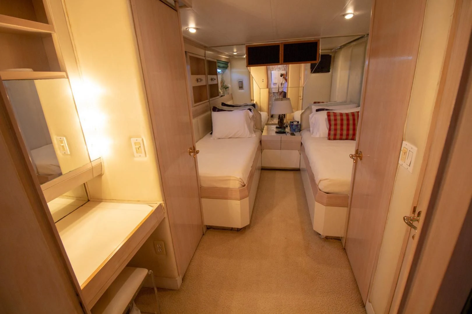 a bathroom with a tub sink and a mirror aboard LIQUIDITY Yacht for Sale