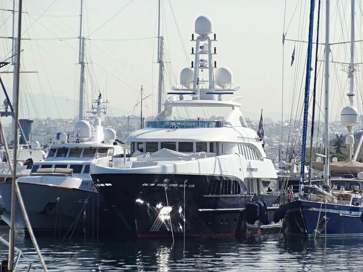 a group of boats are parked in a harbor aboard BLIND DATE Yacht for Sale