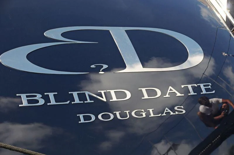 logo aboard BLIND DATE Yacht for Sale