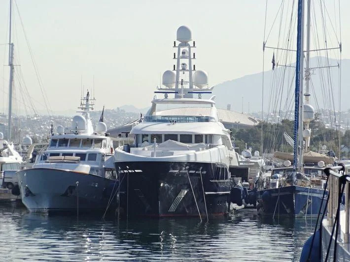 several boats are parked in a harbor aboard BLIND DATE Yacht for Sale