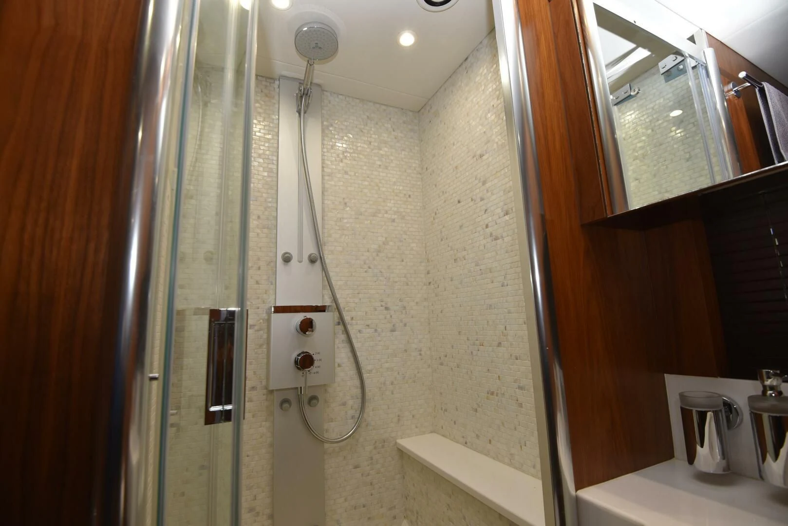 a shower unit in a bathroom aboard SAVI II Yacht for Sale