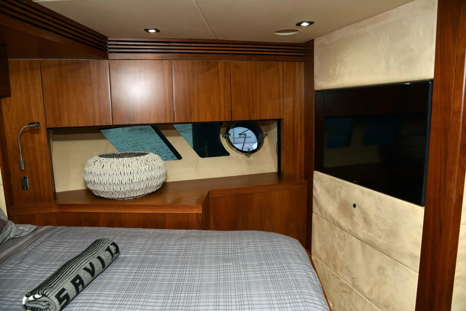 a bed in a room aboard SAVI II Yacht for Sale