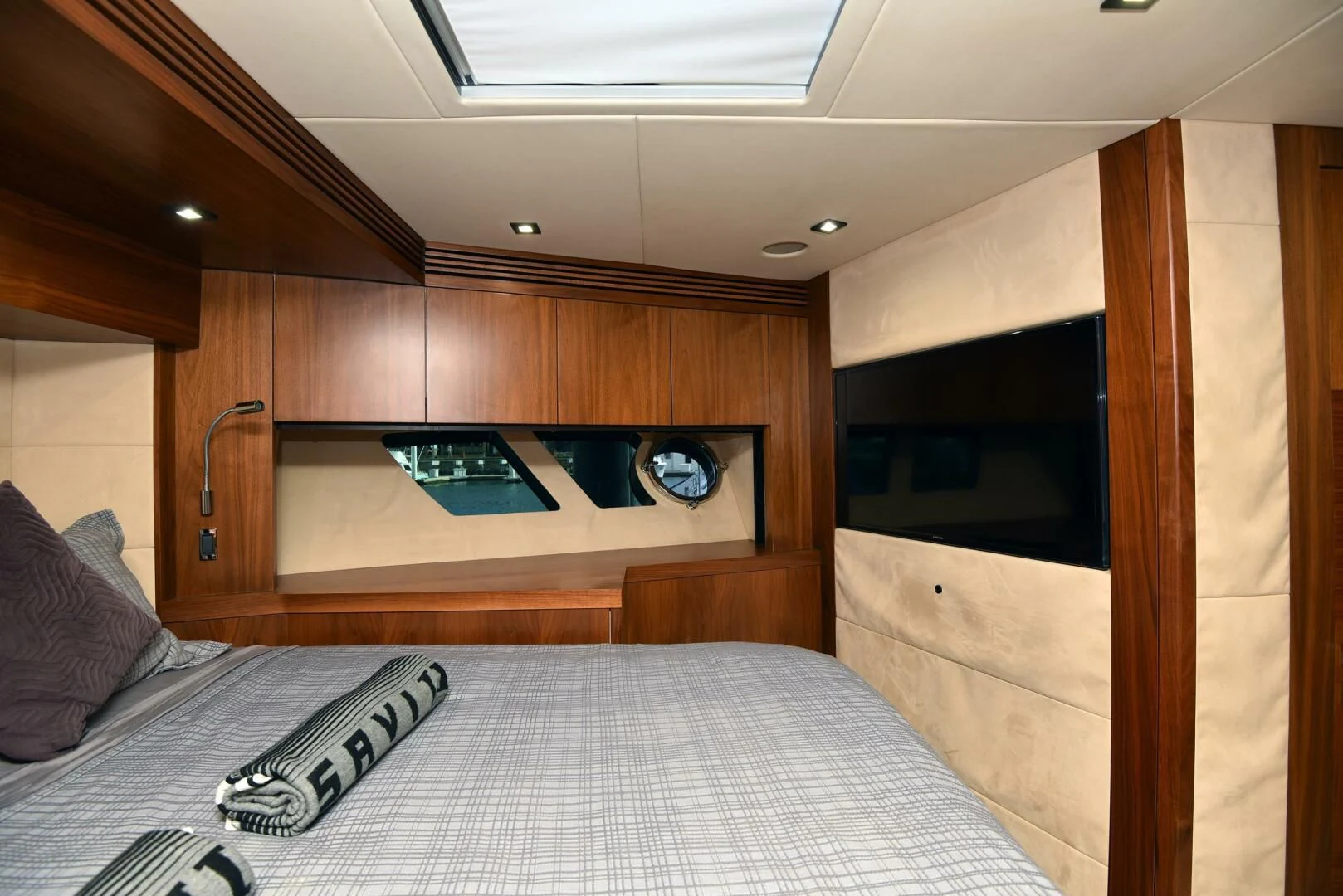 a bed in a room aboard SAVI II Yacht for Sale