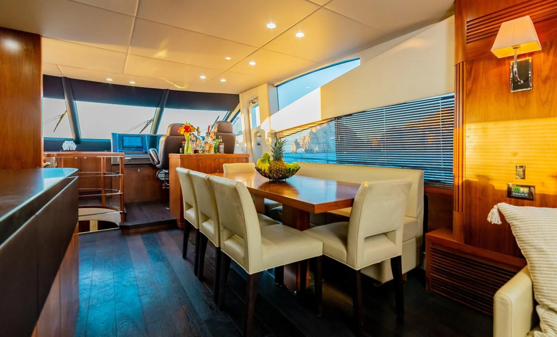 a dining room with a table and chairs aboard SAVI II Yacht for Sale