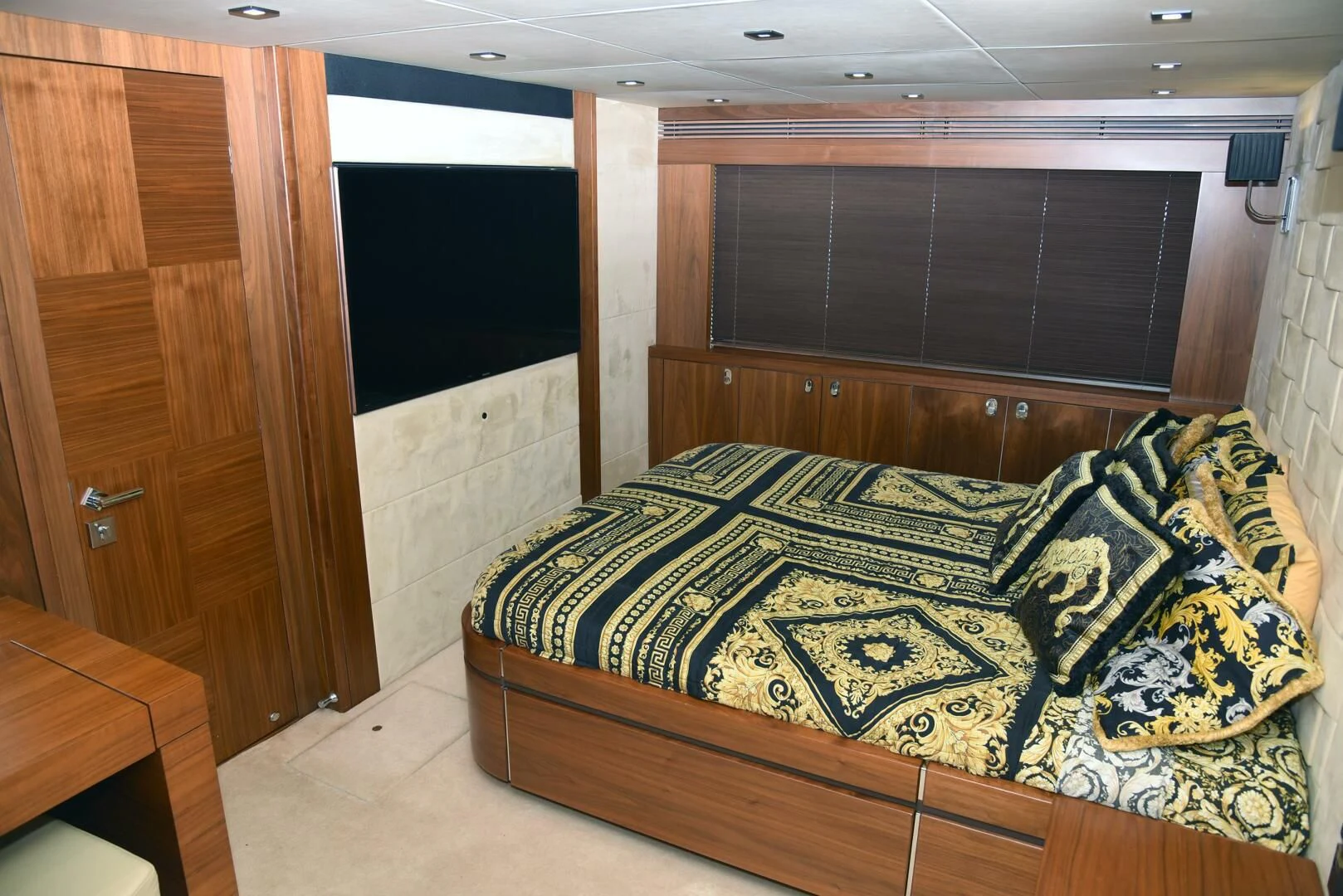 a bed in a room aboard SAVI II Yacht for Sale