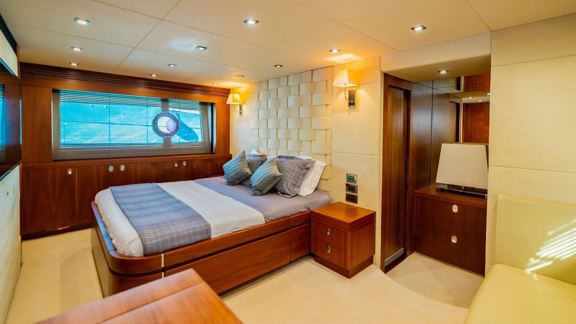 a bed in a room aboard SAVI II Yacht for Sale