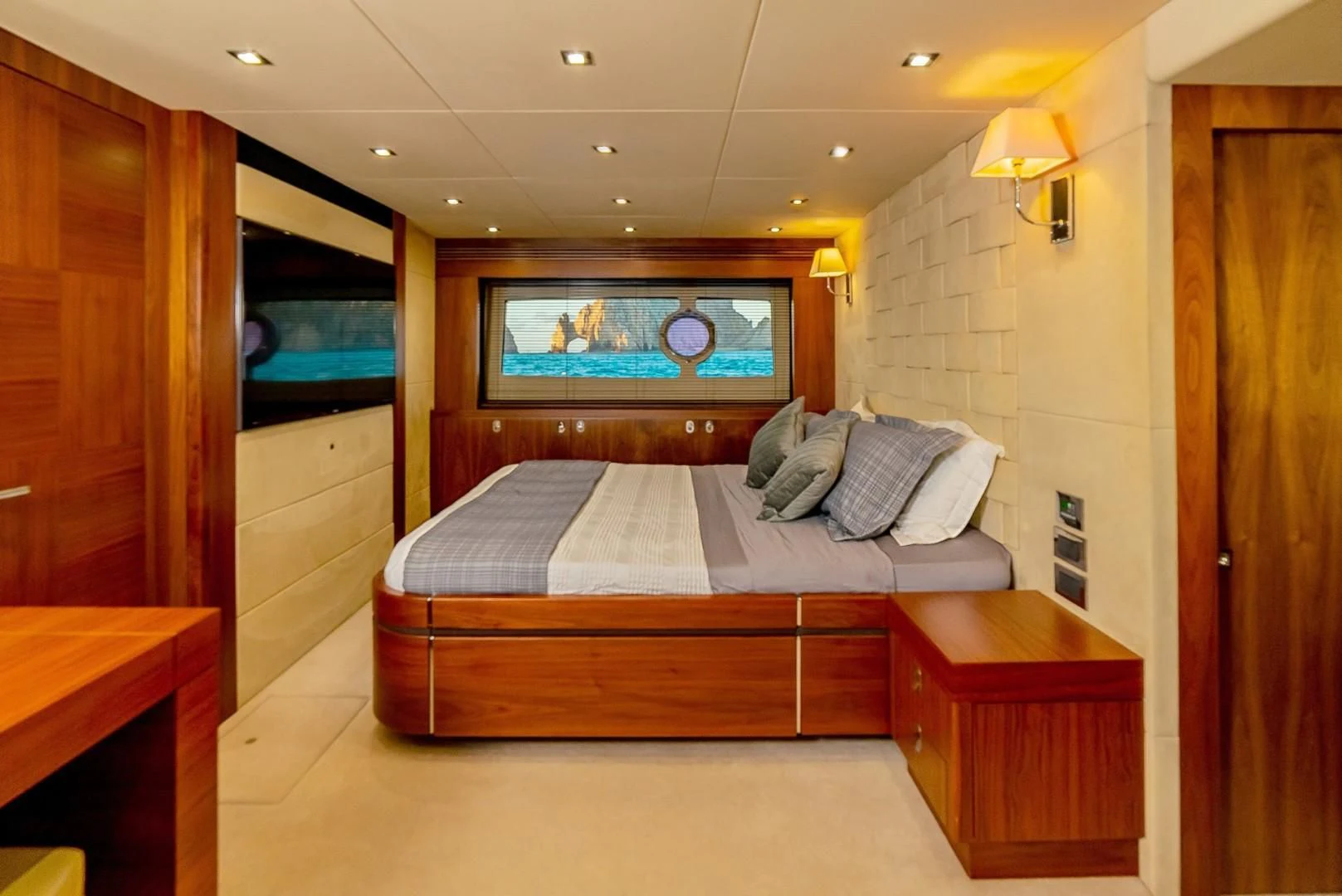 a bed in a room aboard SAVI II Yacht for Sale