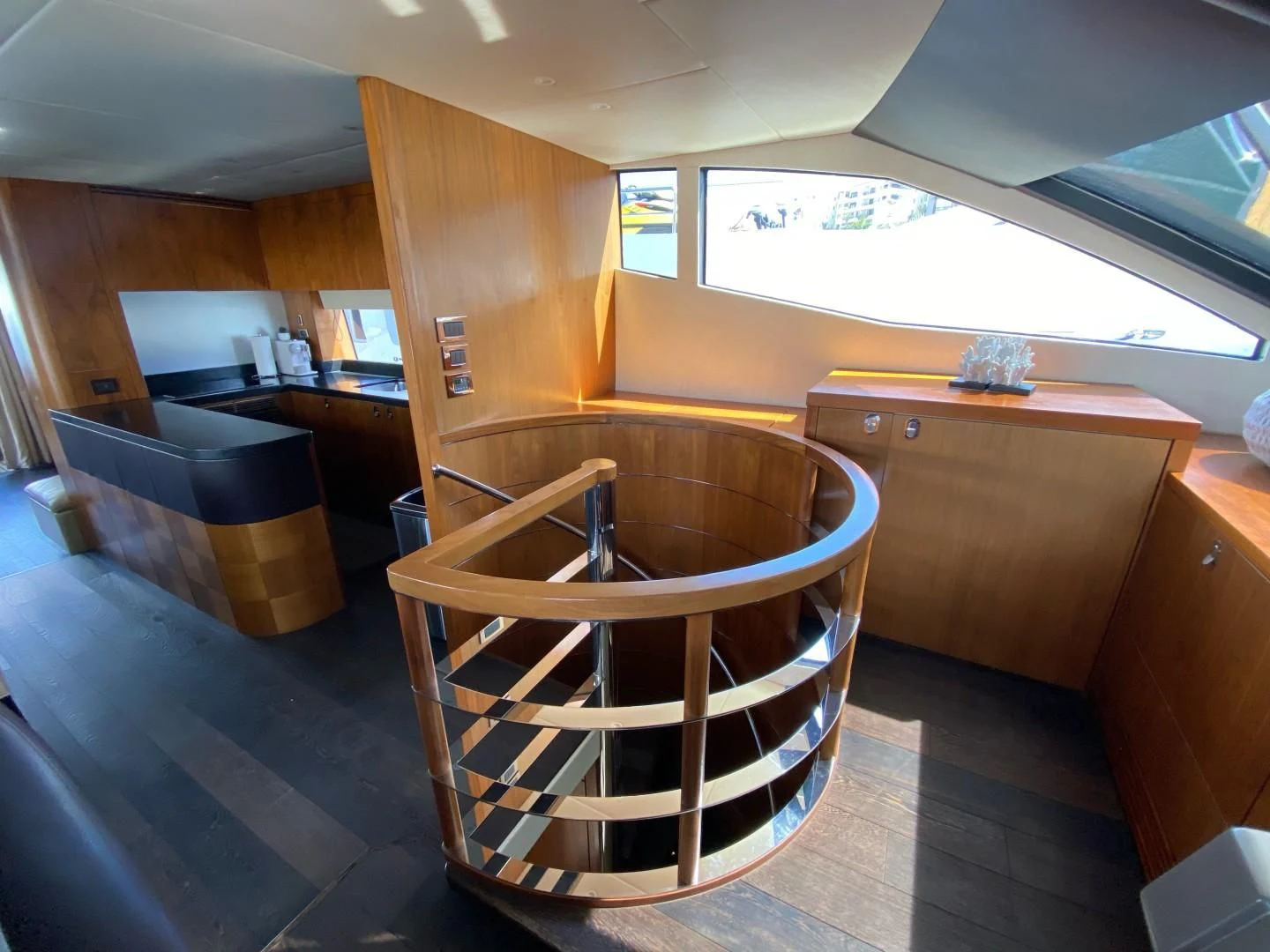 a wooden chair in a room aboard SAVI II Yacht for Sale