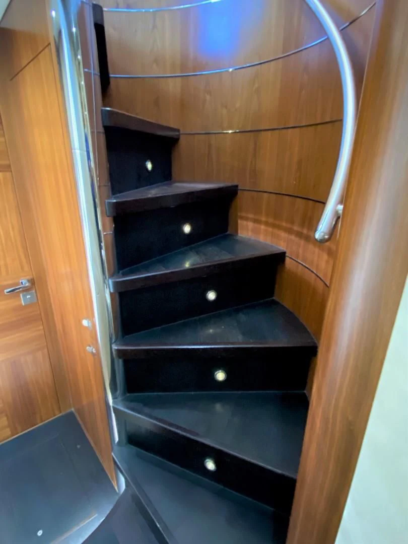 a black cabinet with a silver handle aboard SAVI II Yacht for Sale