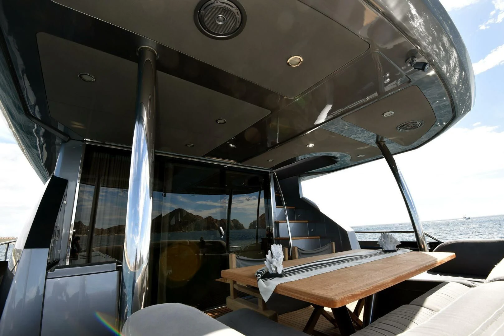 a boat with a table and chairs aboard SAVI II Yacht for Sale