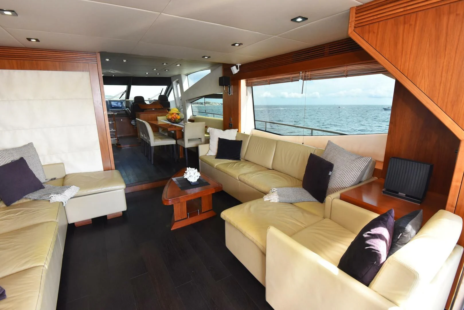 a living room with a large window aboard SAVI II Yacht for Sale