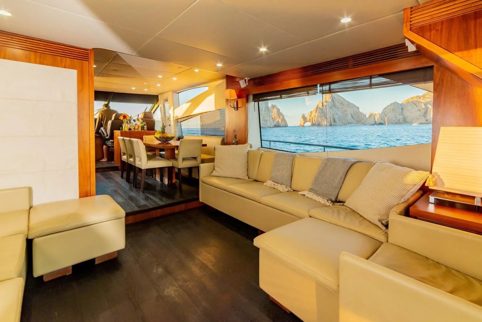 a living room with a large window aboard SAVI II Yacht for Sale