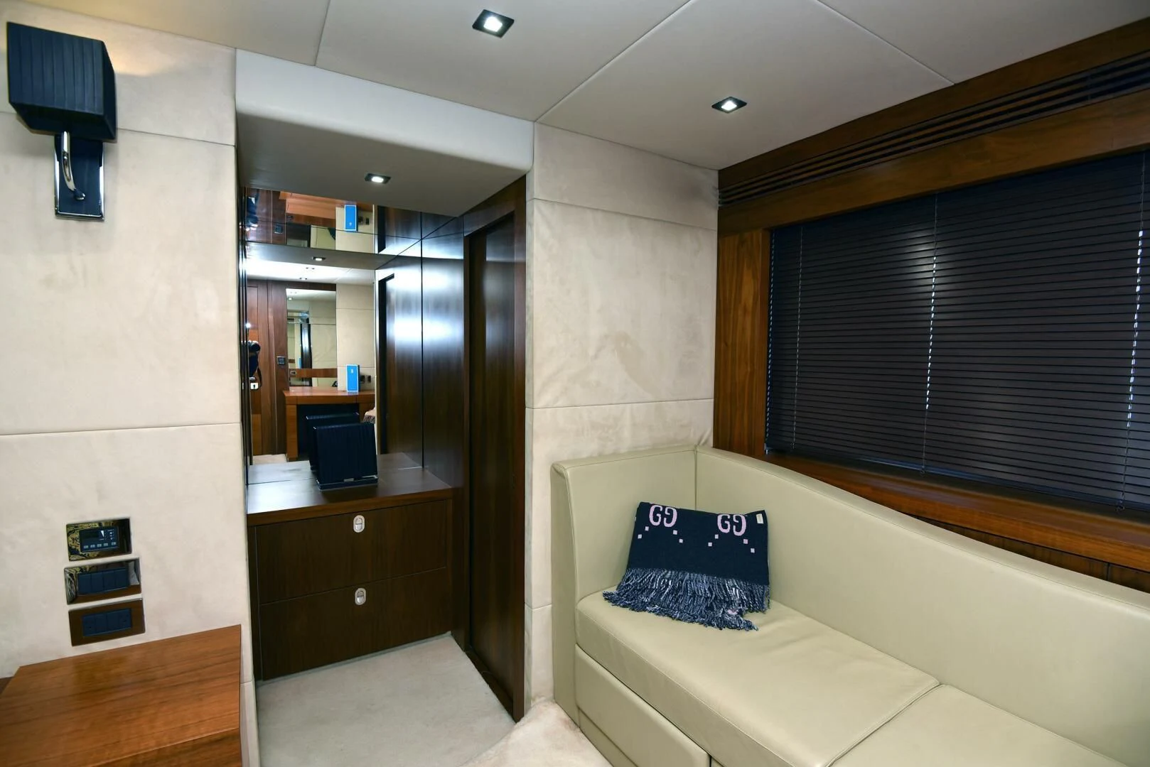 a room with a bed and a desk aboard SAVI II Yacht for Sale