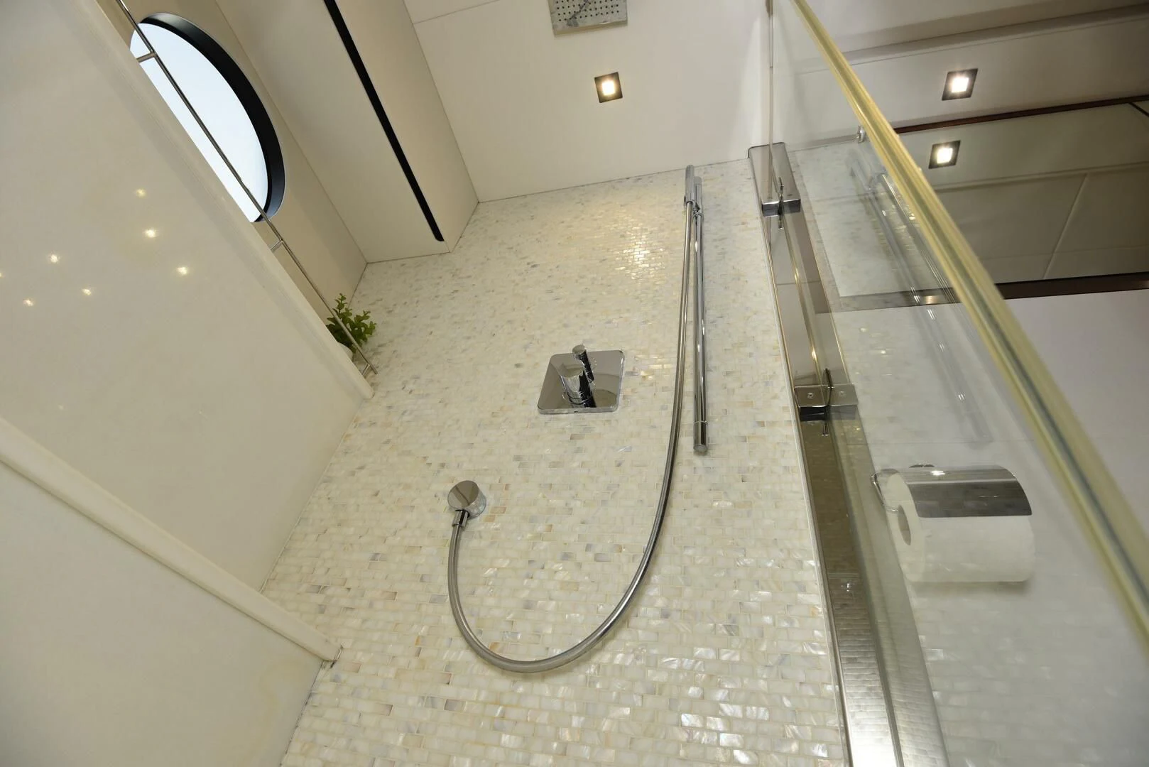 a large empty bathroom aboard SAVI II Yacht for Sale