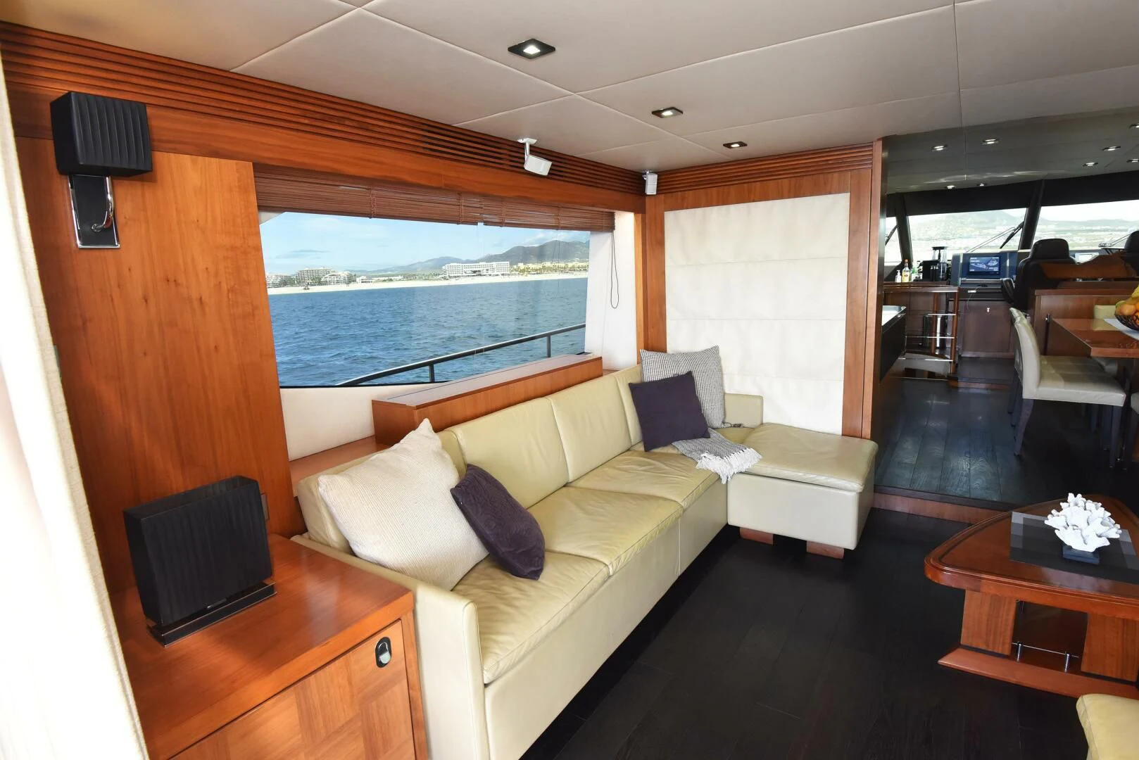a living room with a couch and a table aboard SAVI II Yacht for Sale