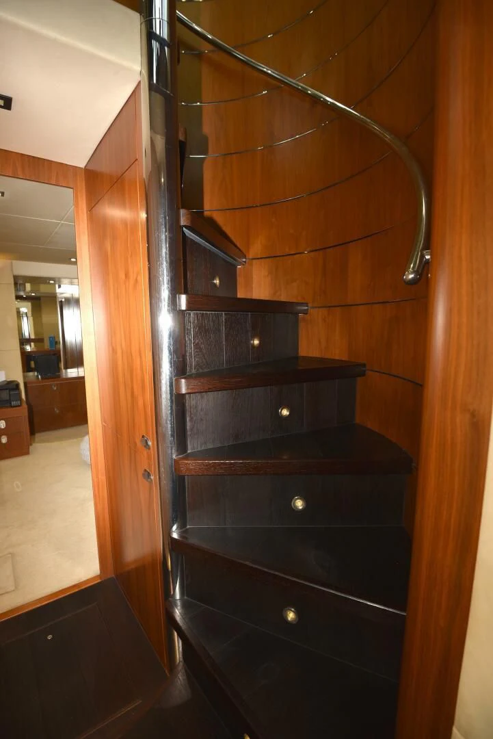 a black cabinet with a handle aboard SAVI II Yacht for Sale