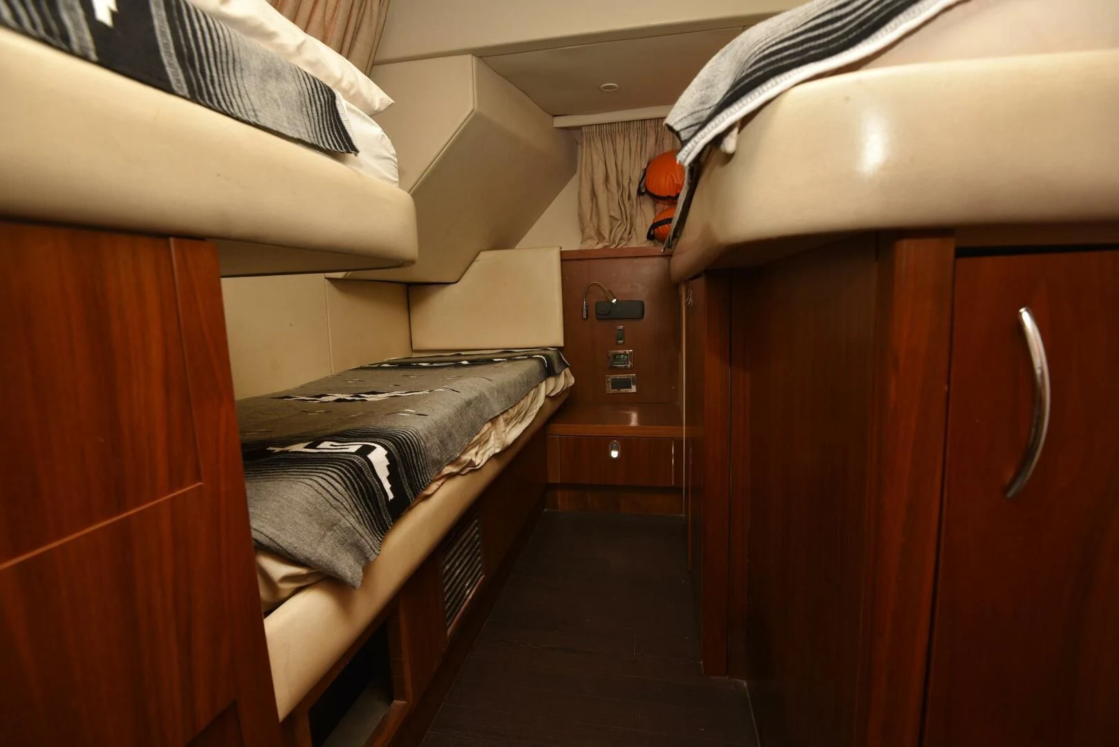 a room with bunk beds aboard SAVI II Yacht for Sale