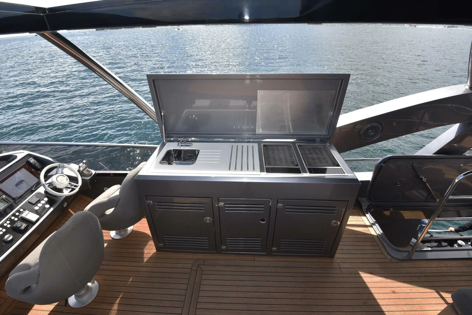 a car with a laptop on it aboard SAVI II Yacht for Sale