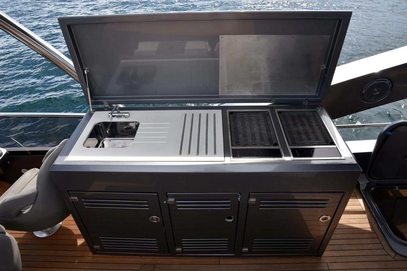 a black and white piano aboard SAVI II Yacht for Sale