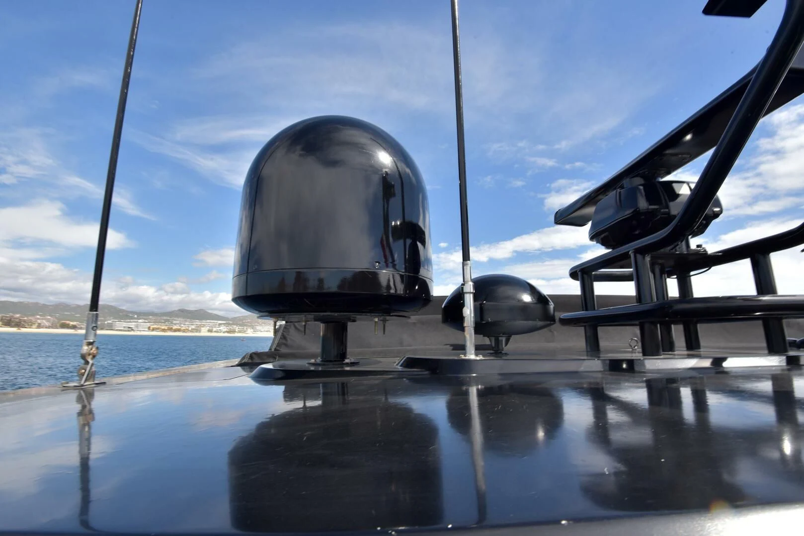 a satellite dish on a beach aboard SAVI II Yacht for Sale
