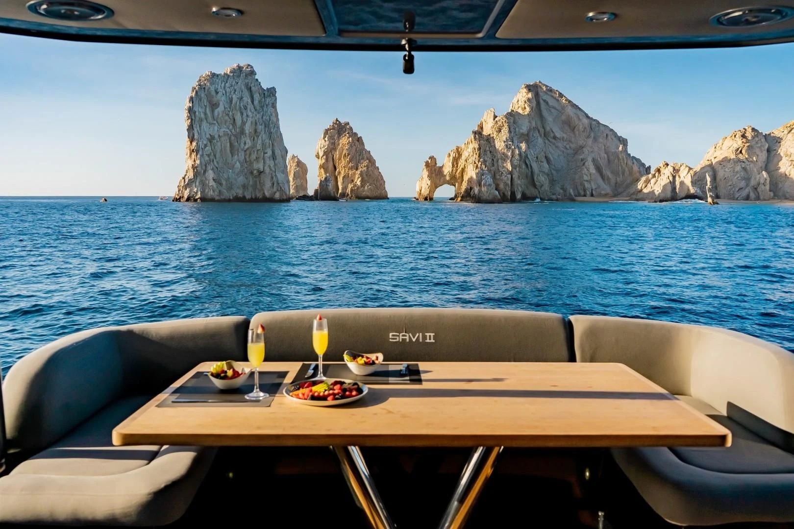 a table on a boat aboard SAVI II Yacht for Sale