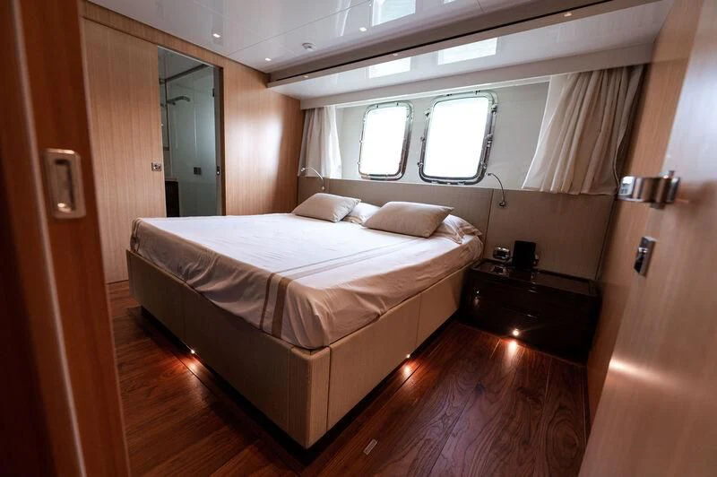 a bed in a room aboard VISSOTTA Yacht for Sale